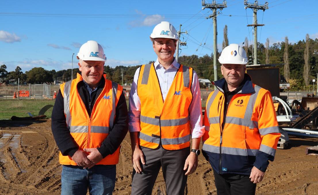 Treasurer Michael Ferguson with representatives of Andrew Walter Constructions this week. Picture supplied