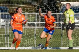 Imogen Donoghue and Meg Connolly bundle Riverside's first goal in past United keeper Jaz Venn. Picture by Phillip Biggs