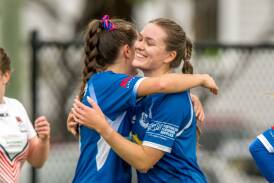 Goal-scorer Bianca Anderson celebrates with United teammate Laura Dickinson. Picture by Phillip Biggs