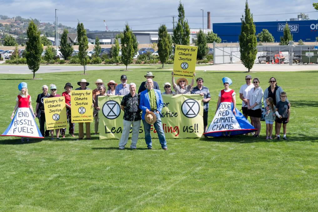 Scott Bell and Jeff McKinnon with their supporters and members of Extinction Rebellion. Picture by Phillip Biggs. 