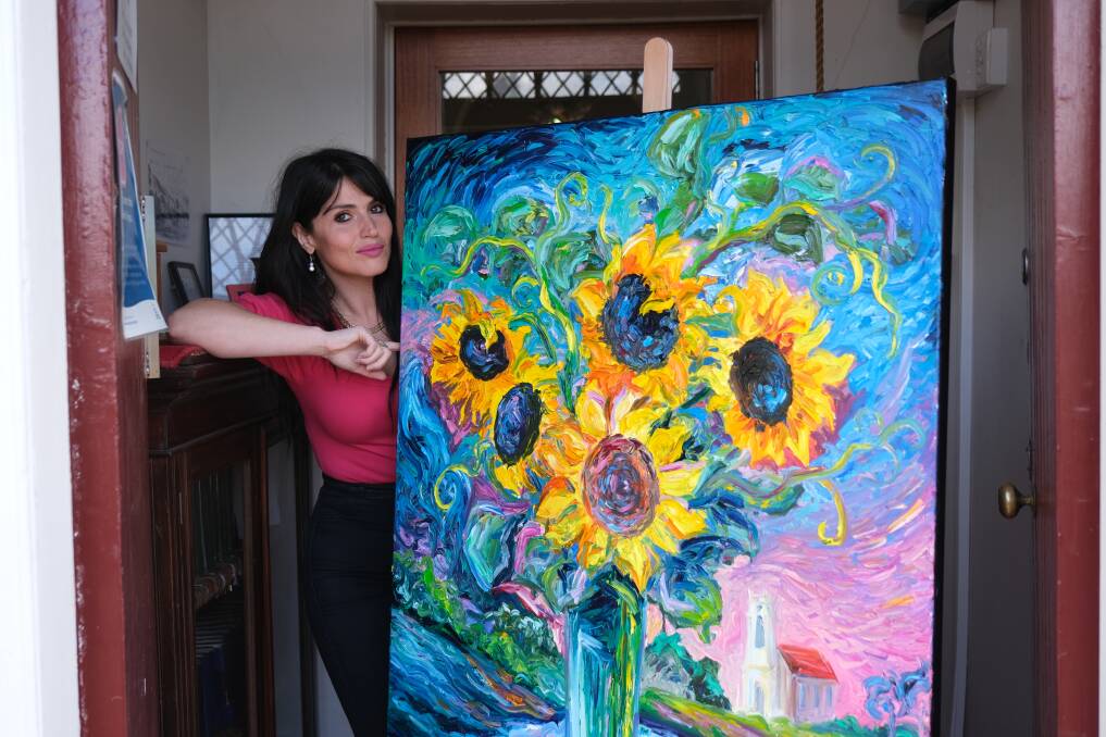 Eleonora Pulcini with her piece 'Eternity's Bloom', which she'll sell for upwards of $5,000 at auction. Picture by Declan Durrant