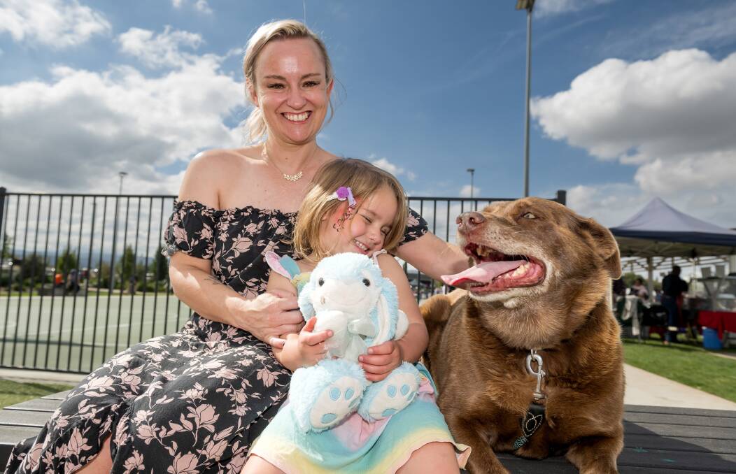 Kristy Spilsbury of Hadspen, with Ava and Charlie at the Children and Families festival at Riverbend Park, Launceston. Picture by Phillip Biggs 