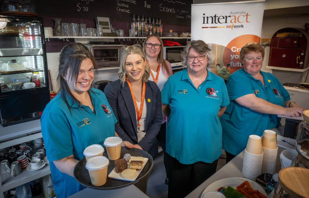 Chelsea, Hannah Webb and Dayle Clark from Interact Australia, Vanessa Mitchell (Cafe Next Door owner) and Allison. Picture by Craig George