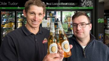 Boags key account manager Scott Hill and Olde Tudor bottle shop manager Nick Pedley. Picture by Philip Biggs.