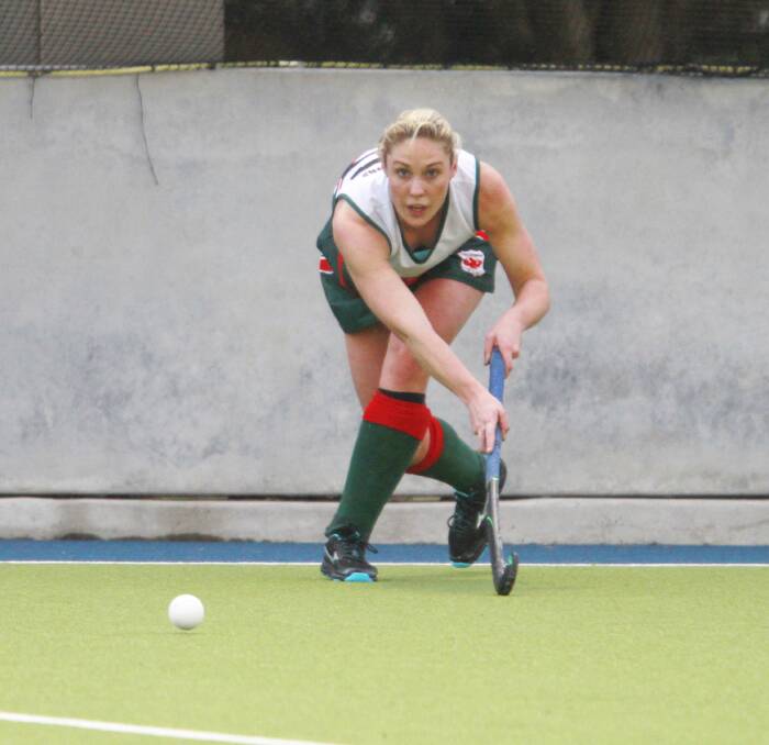 WILL TO WIN: West Devonport's Sammy Lawrence watches her pass closely. West will take on Queechy this weekend in the game to decide who will step up into the last grand final spot. Picture: Brodie Weeding
