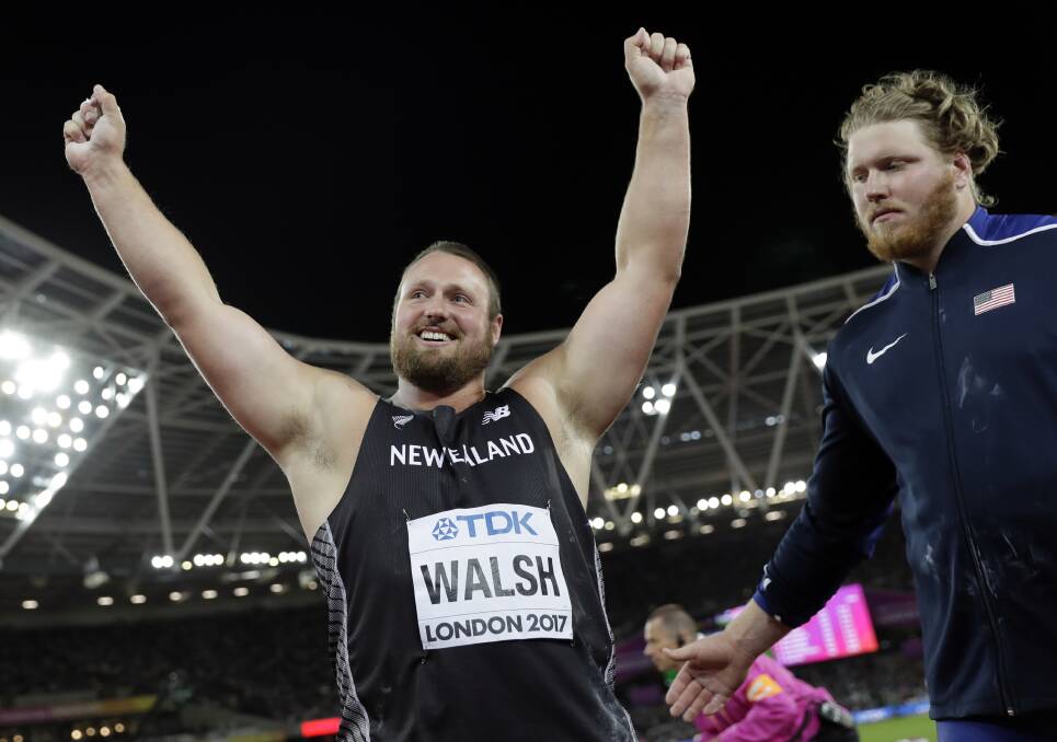 United States' Ryan Crouser, right, congratulates gold medal winner New Zealand's Tomas Walsh after the men's shot put. Picture: AP Photo/Matthias Schrader