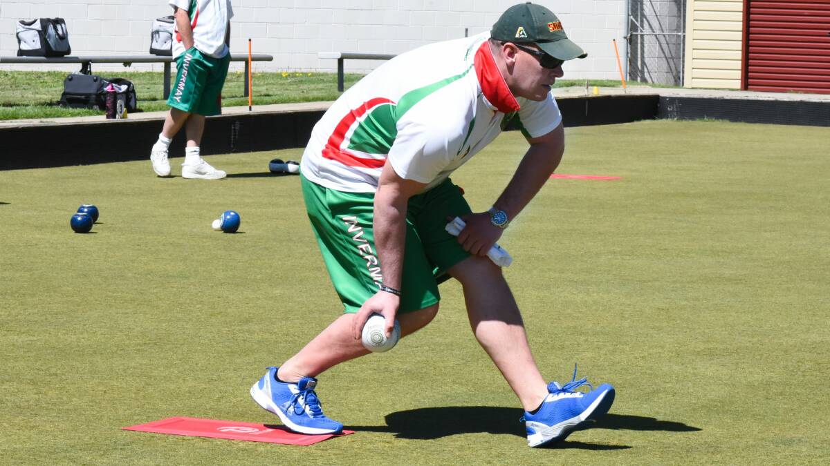 DEBUT: Gene Ayton from Invermay takes a shot against Scottsdale. Invermay has moved up from Division 1 and is keen to prove themselves. Picture: Neil Richardson