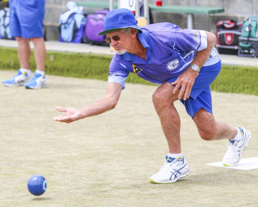 VALIANT EFFORT: Penguin's Wayne Manson takes his shot in the game against South Burnie which the Two Blues lost by just two shots. Picture: Cordell Richardson.
