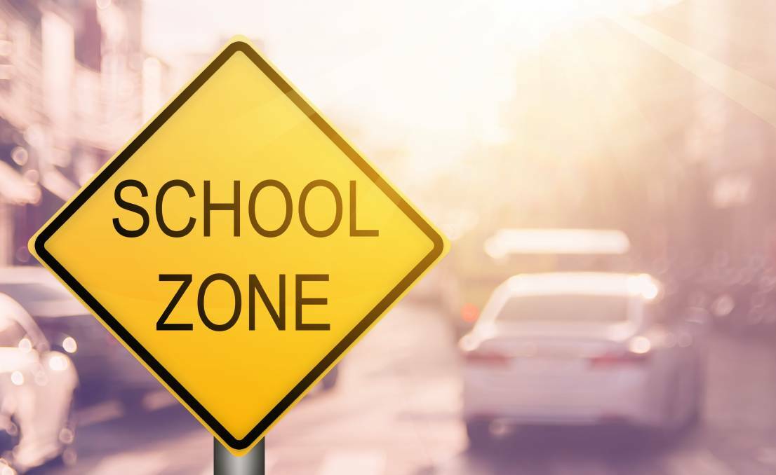 School zone safety warning after student hit crossing road