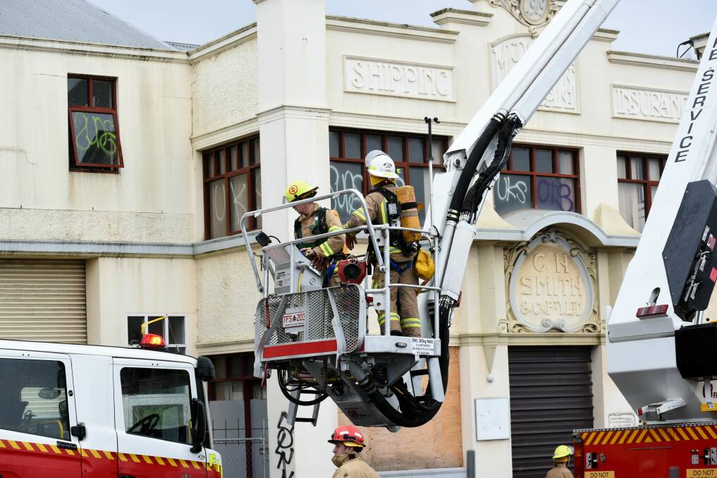 Tasmania Fire Service investigating reports of a fire at the old CH Smith building in Launceston on Friday. Picture: Neil Richardson.