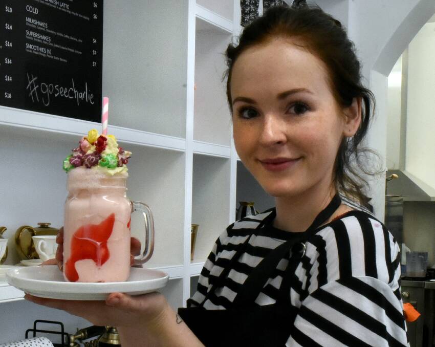 TASTE OF SUCCESS: Charlie's Dessert House owner Brooke Saward celebrated the grand opening of her late night restaurant in Launceston on Saturday. 