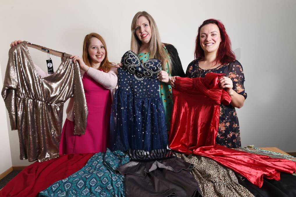 FROCKTOBER: Rhea Gillie, Bec Nicholson and Katy Pakinga have formed the 'Rock On With Your Frock On' team to raise funds for ovarian cancer research. Picture: Scott Gelston.