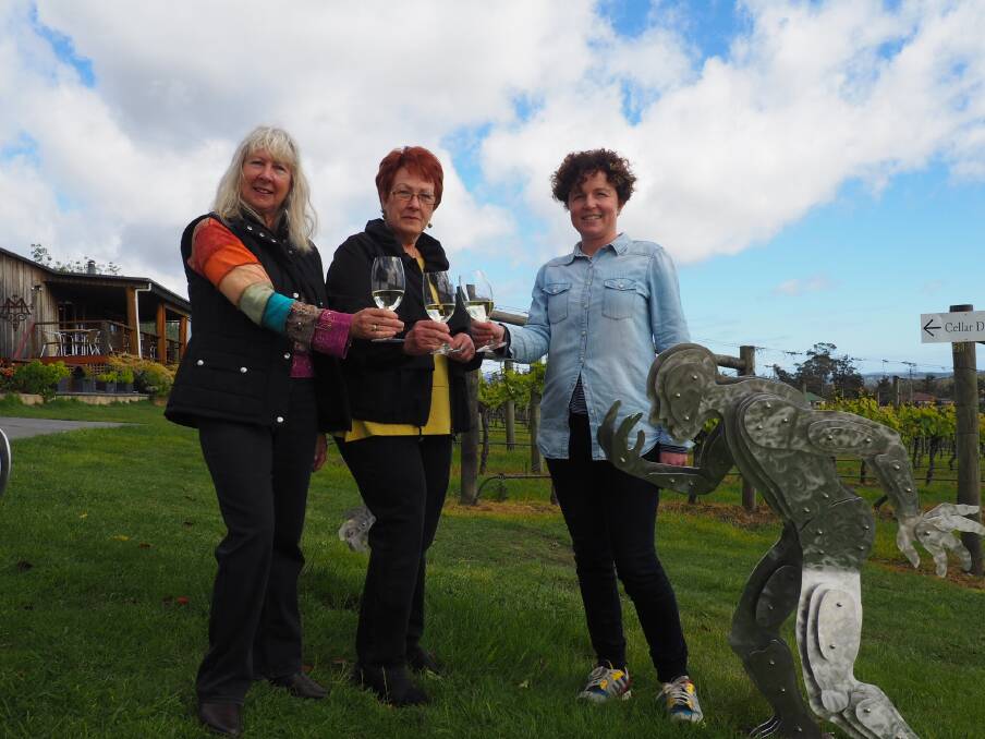 Hilary Keeley, Brenda Fenerty and Fiona Weller celebrating this year's  Artentwine Sculpture Biennial events at Moores Hill Estate. Picture: Melissa Mobbs
