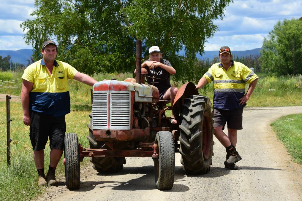 SURPRISE: Jake Harper with David Berwick and Dean Reynolds checking out the 1940's International W4 tractor. Pictures: Paul Scambler