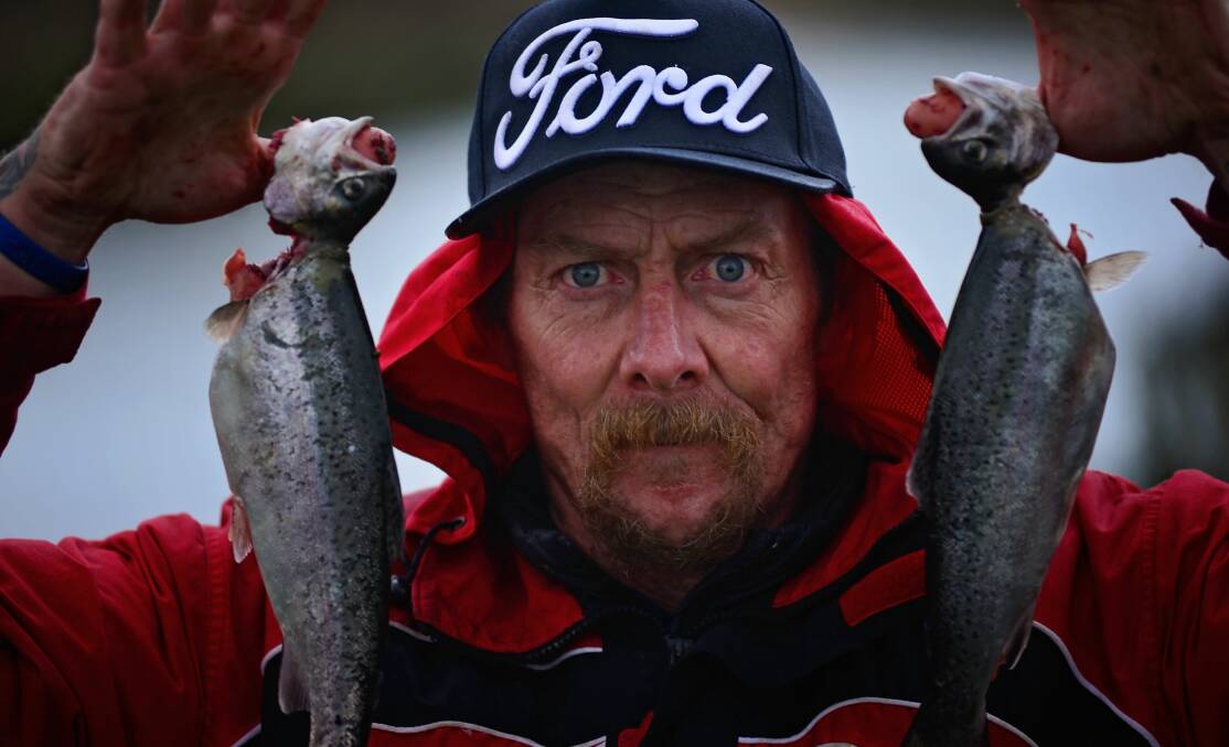 DOUBLE TROUBLE: Launceston angler Peter Joyce was left reeling after a successful Sunday at the trout expo at Cressy. Picture: Phillip Biggs