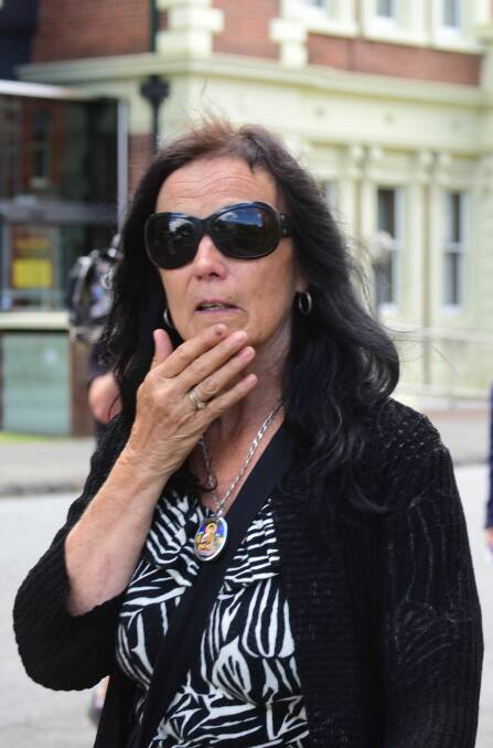 HEARTBROKEN: Trina Kejna leaves the Launceston Supreme Court after her partner's killer was found guilty of his murder. 