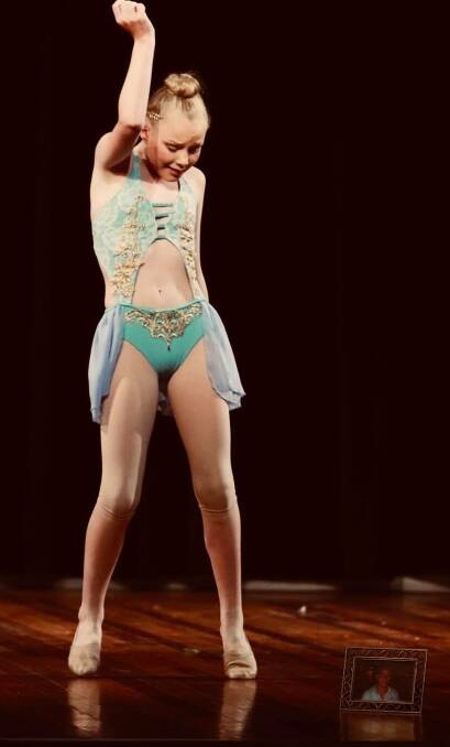 Charlize Delanty-Butzin, 11, dancing in tribute to her dad, Lucas, who was killed in a crash in 2006. Picture: Supplied