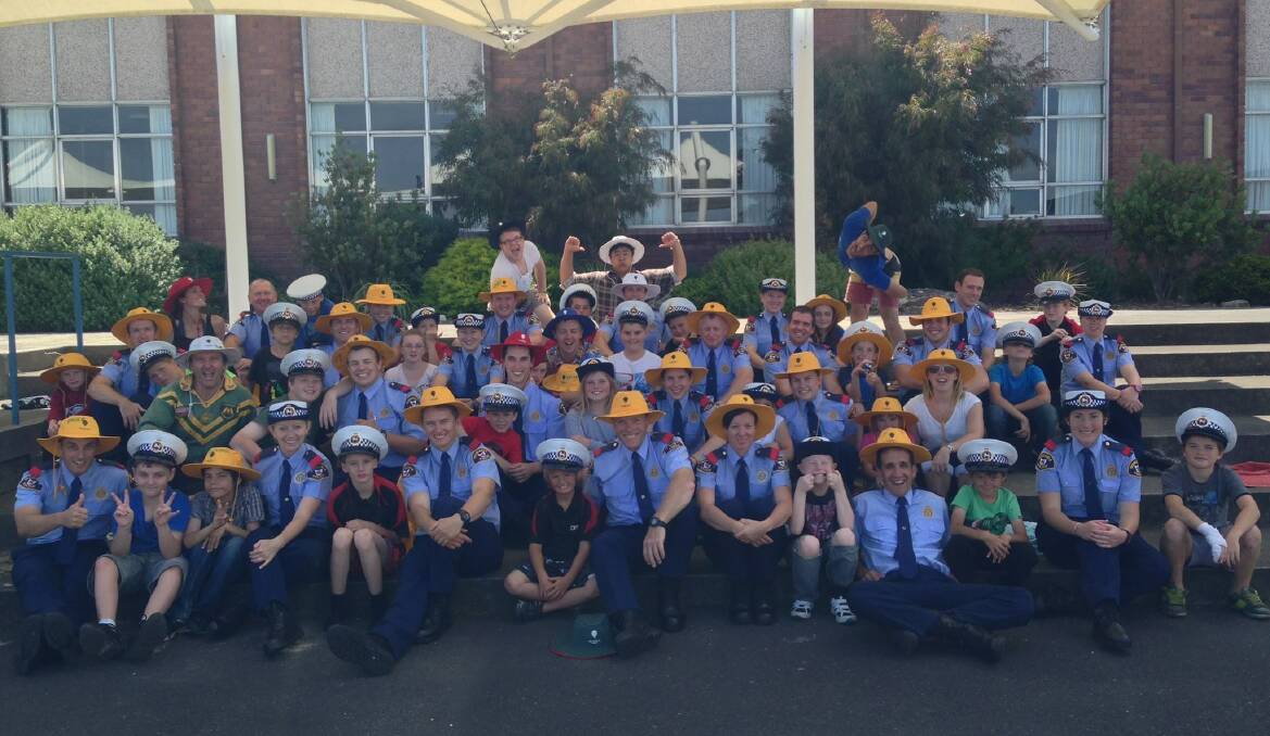 VOLUNTEERS: The Tasmania Police Recruits Program was launched in 2014, allowing officers to volunteer with Edmund Rice Camps Tasmania. Picture: Supplied