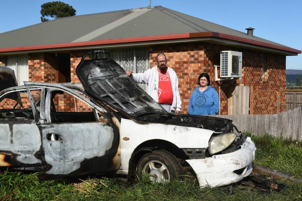 WAKE UP CALL: Grant and Melissa Battye are calling for "more police patrols" in their neighbourhood after a car crashed through their fence overnight. Picture: Neil Richardson