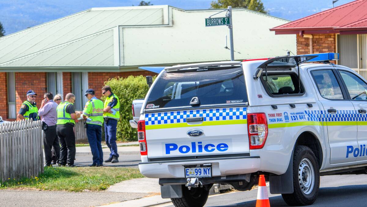 Police at the corner of Knox and Burrows streets at Prospect Vale where a man was allegedly run over. Picture: Neil Richardson