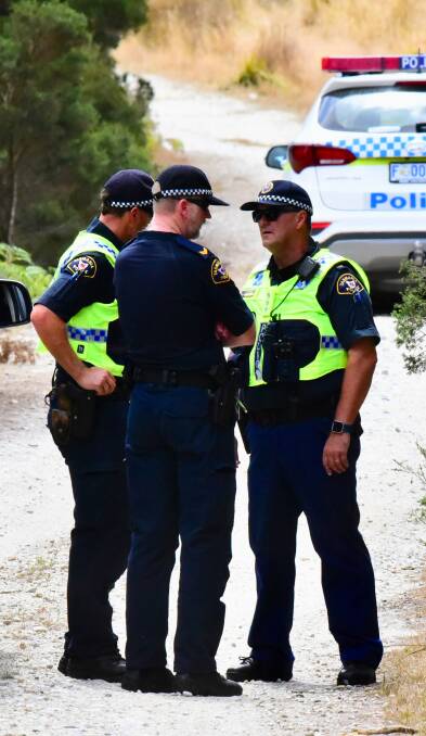 WOMAN KILLED: Tasmania Police officers at the scene of Saturday's plane crash on a farm in the state's North-East. Picture: Neil Richardson