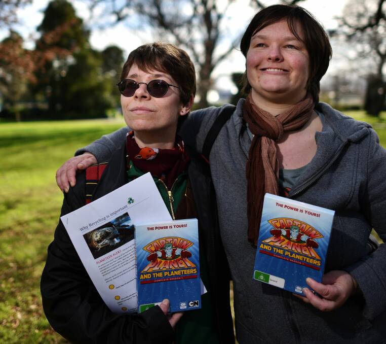 GO PLANET: Planeteers Laura Fitch and Desiree Johnston are encouraging Tasmanians to care about the environment.  PICTURE: Scott Gelston.