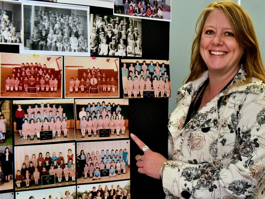 LOOKING BACK: School principal Sharryn Crothers with a photo of herself as a grade 5 pupil.