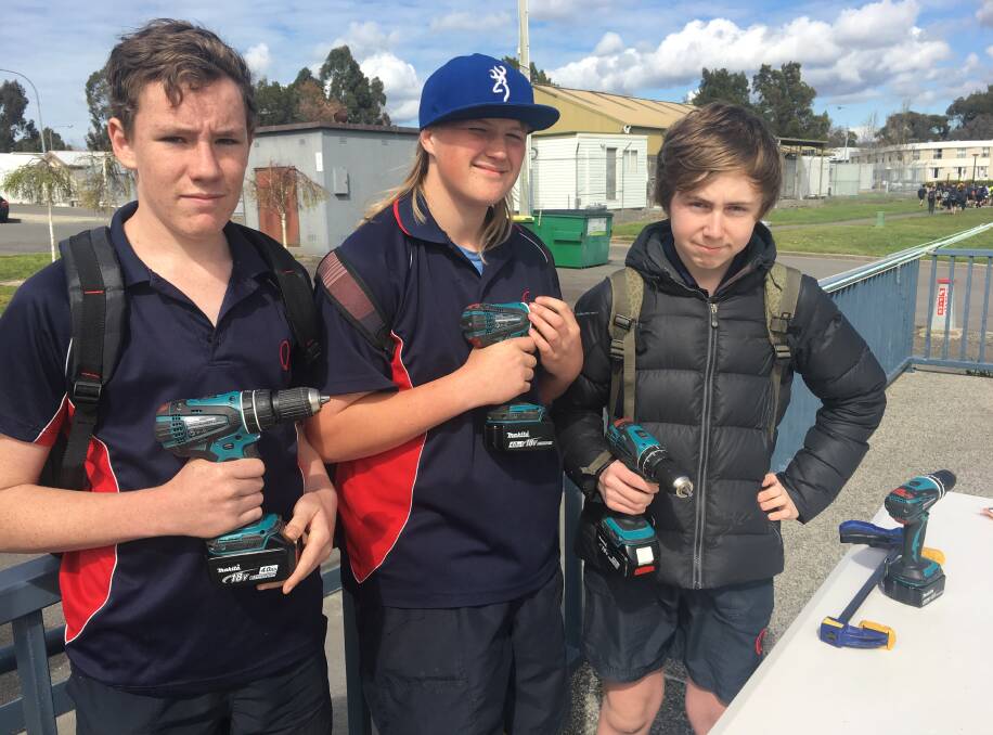 CAREERS DAY: Queechy High School students Jackson Smith, Zeth Cartledge and Jack Shields, all 15, learning about the construction industry.