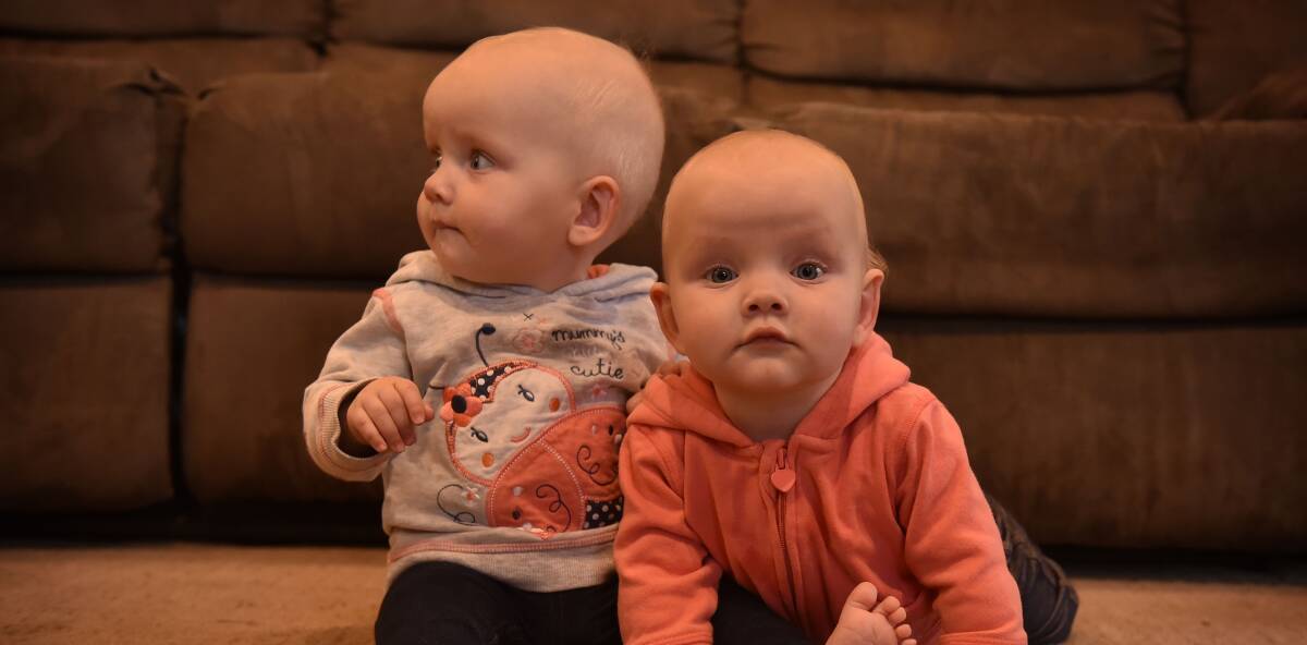 GROWING UP: Hadspen twins Kelly and Taylor Eilander are now 10 months old and their bond is stronger than ever. Picture: Scott Gelston