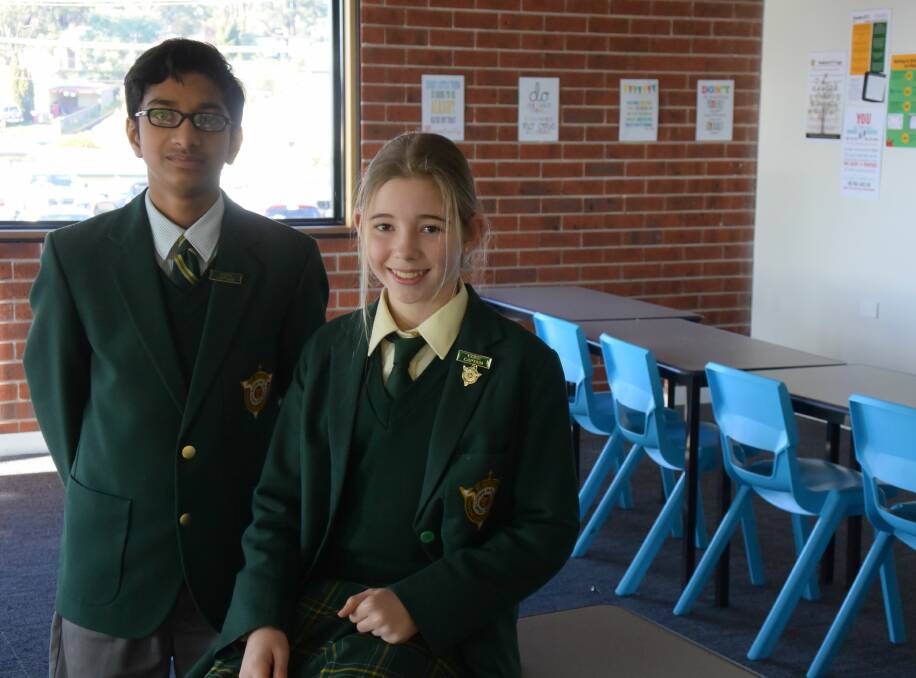 OFFICIALLY OPEN: St Patrick's College year 7 students Blaise Wilson and Kate Mcleod, both 12, in one of the middle school's newly opened classrooms.