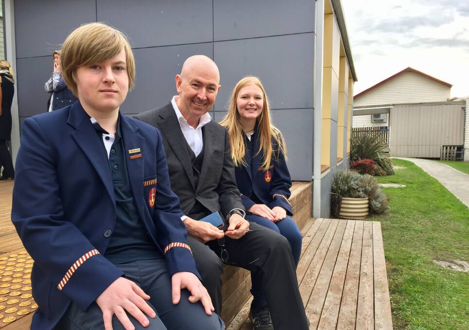 FUNDING: Year 10 students Max Mansfield and Bianca Glanville, both 15, with Commissioner for Children and Young People Mark Morrissey at the announcement of $6.9 million in budget funding for schools. Picture: Michelle Wisbey