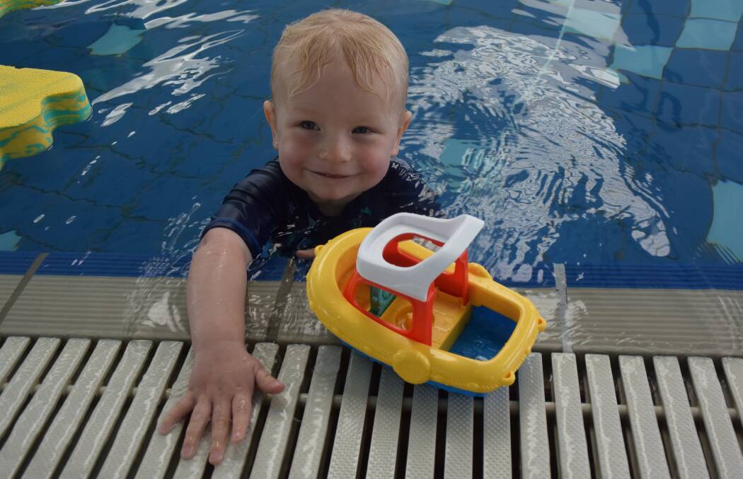 SAFE SWIMMING: Toby Pooley, 20 months, loves splashing about in the water at the Launceston Aquatic Centre. Picture: Michelle Wisbey