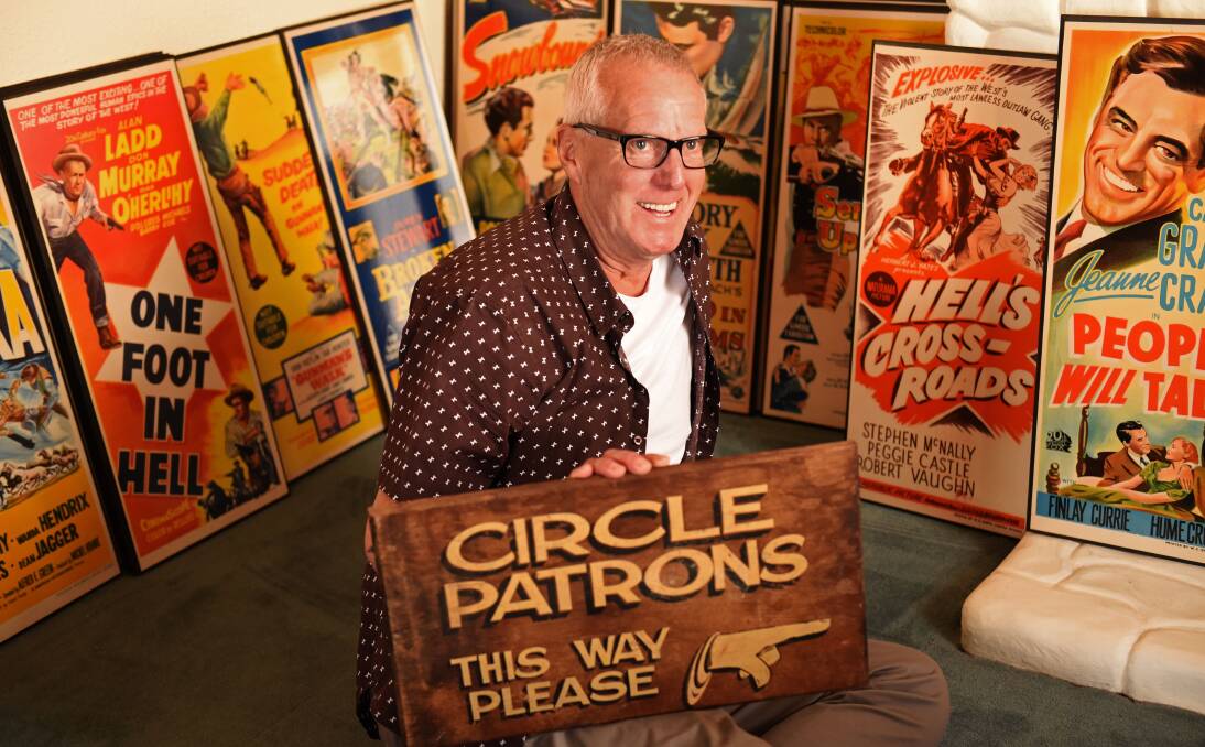 MEMORABILIA: Former Star Theatre employee Peter Bomford with film posters and an original sign from the theatre. Pictures: Scott Gelston