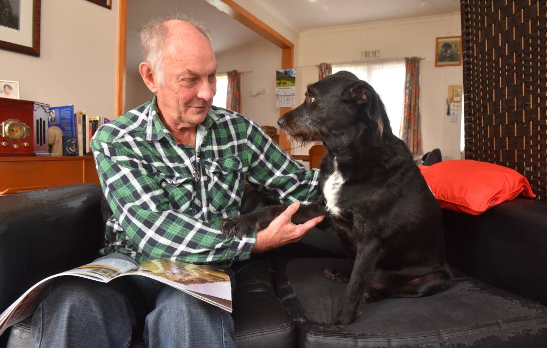 UNBREAKABLE BOND: Vietnam War veteran Garry Gleadhill with Canem, who he says saved his life. Pictures: Paul Scambler. 