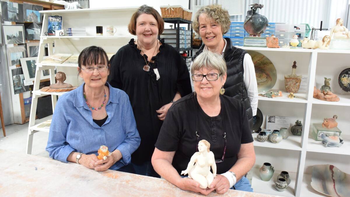 SUPPORTING ST GILES: Tin Shed artisans Edna Broad, Gayle McLucas, Diana Targett and Helen Bower at the Invermay studio with their handiwork. Picture: Tamara McDonald