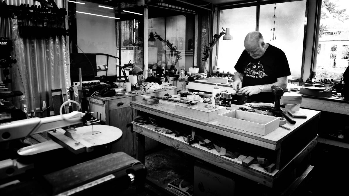 EYE FOR DETAIL: Bruce Trappes at work at his Swan Point shed.