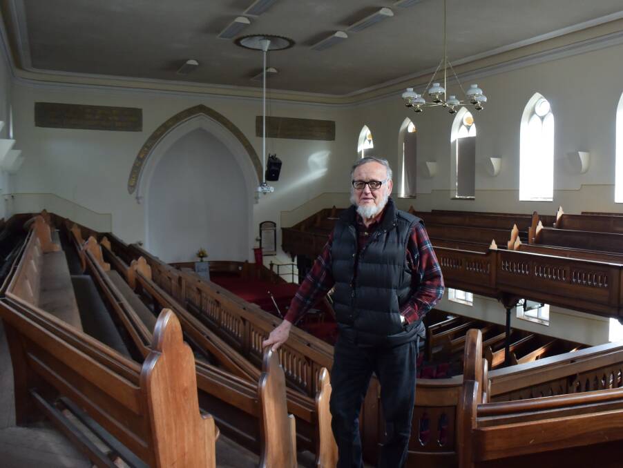 GRAND INTERIOR: Gateway Baptist Church co-deacon Peter Cuthbertson at the Wellington Street church, which can hold 1200 people.