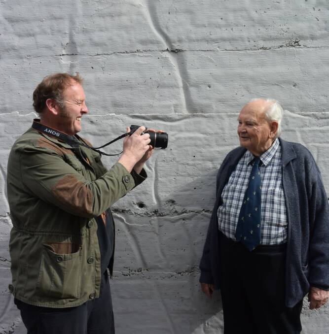 SHOOTING PORTRAITS: Adam Page snaps a shot of Dr Willem de Boer, who lives at an aged care facility at Newstead. 