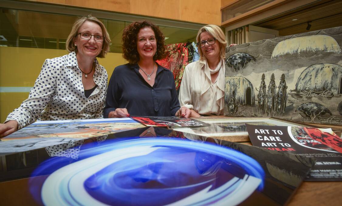 CREATIVE FUNDRAISING: Care for Africa committee members Carol Northeast and Jenny Saunders with chief executive and co-founder Diana Butler, ahead of a charity fundraising art exhibition. Picture: Paul Scambler