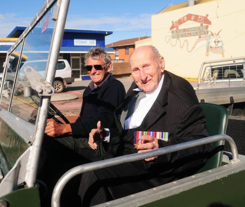 TRADITION: Richard Edmunds drives Mr Geale at the 2015 George Town Anzac Day parade. Picture: Paul Scambler