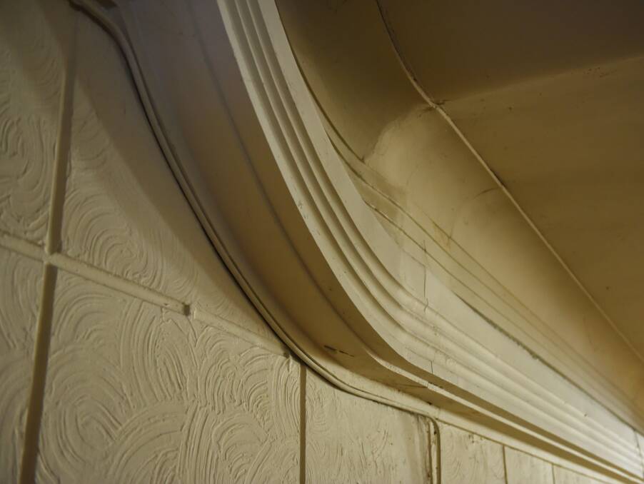 NEUTRALS AND NEON: Inside the original cinema, tubing was used with neutral paint colours to create neon illumination. 