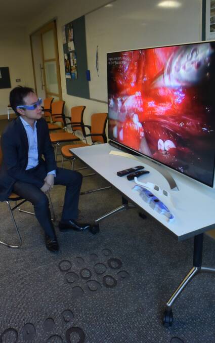 ROBOTICS: St Vincent’s Hospital Melbourne urologist Lih-Ming Wong watches the device in action.