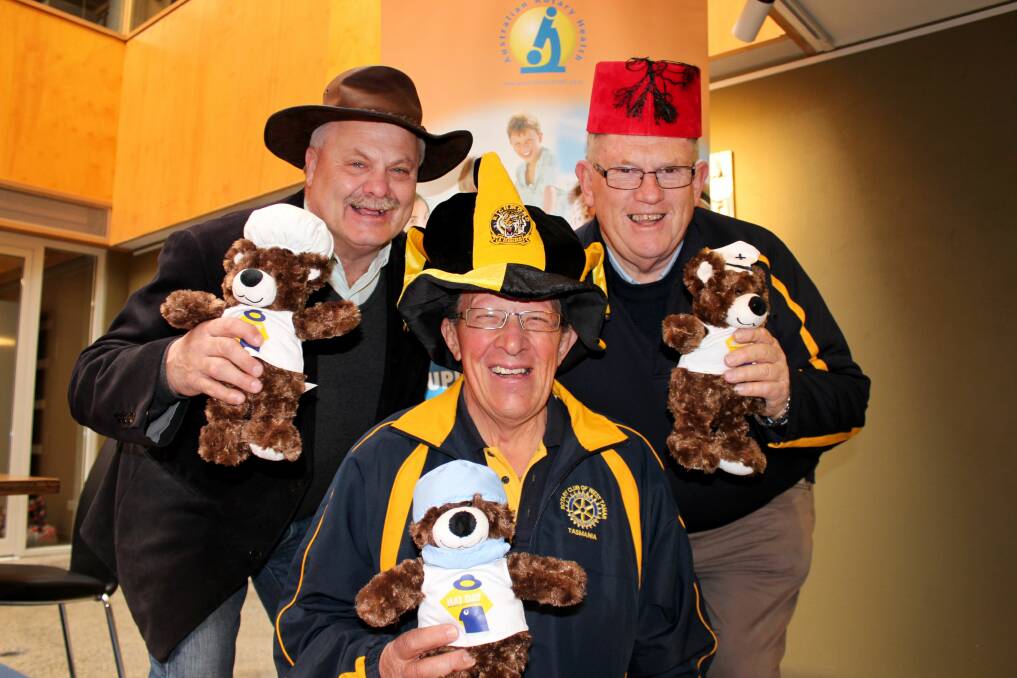 Rotary Tasmania district governor Gerard Blizzard and West Tamar Rotarians David Annear and Kerry Scurrah before a mental health fundraiser. 