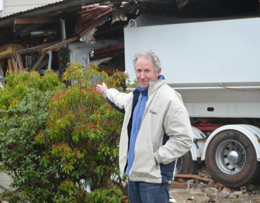 DISASTER: Dale Mountney in front of his home after a truck ploughed through it. Photo: Toli Papadopoulos