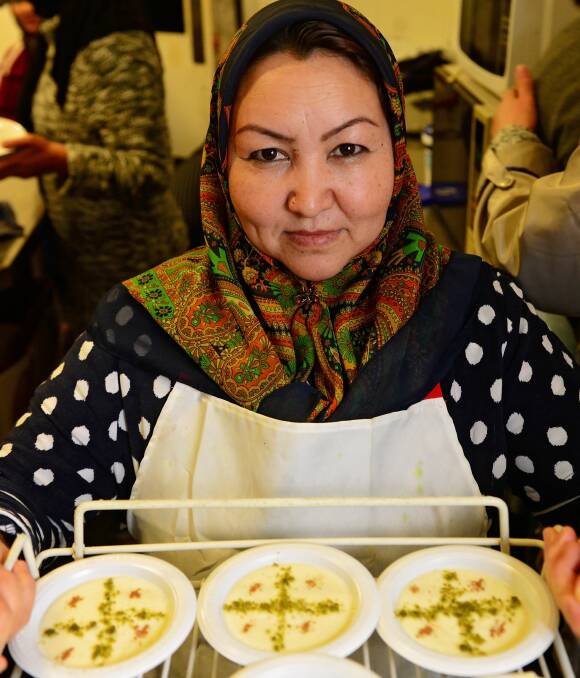 CRISP: Habibeh Alizadah serves up lunch at the Inveresk Tavern. Picture: Phillip Biggs 