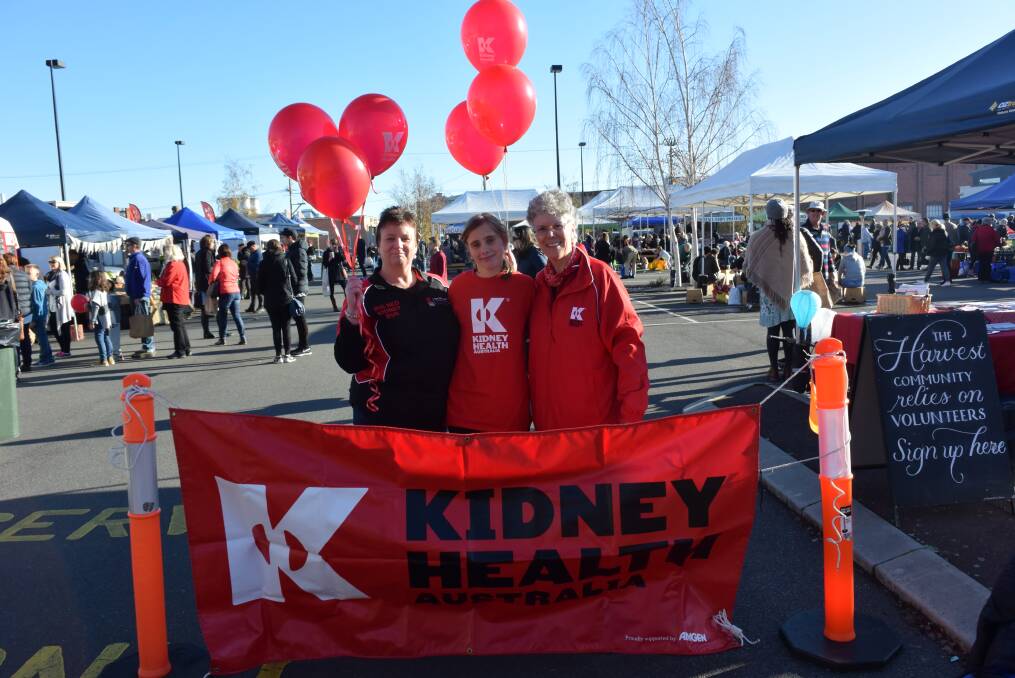 STRONG SUPPORT: Sarah Challenor, Nicole Bassett, 15, and Alison Clayton fly the flag for Kidney Health Australia. Picture: Toli Papadopoulos 