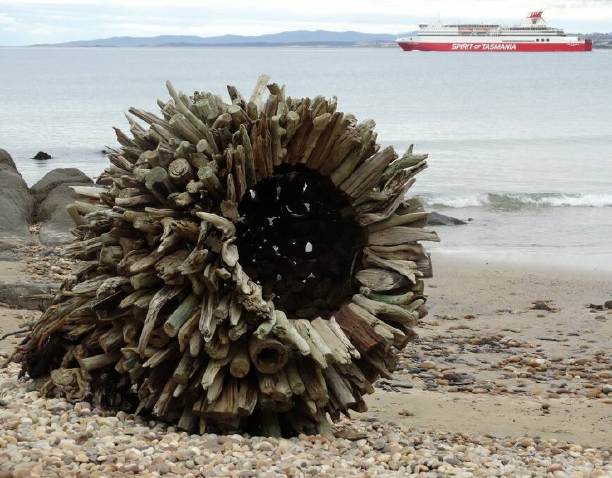 CREATIVITY: Tasmanian sculptor Marcus Tatton presents 'Spore' at Bluff Beach.