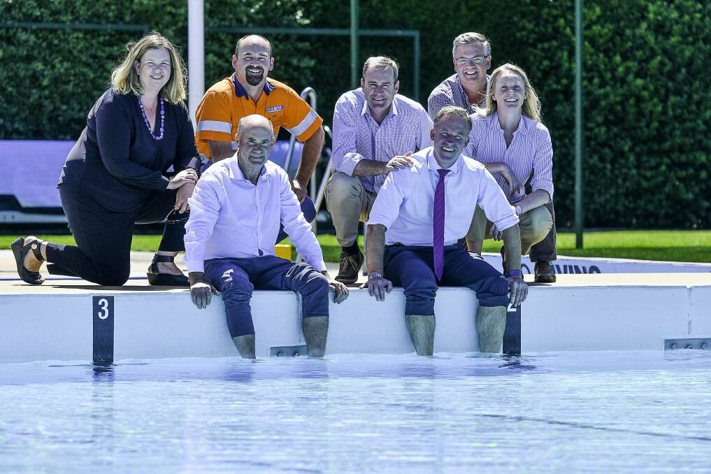 SPLASH: Dorset Mayor Greg Howard and Premier Will Hodgman get their feet wet in the Scottsdale Swimming Pool. Picture: Scott Gelston.