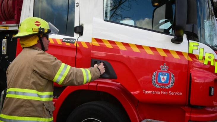 Tasmania Fire Service attending vegetation fire at Mowbray