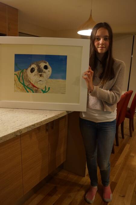 Binalong Bay 13-year-old artist Tara Bursic with her entry for the festival's Youth Art Prize. 